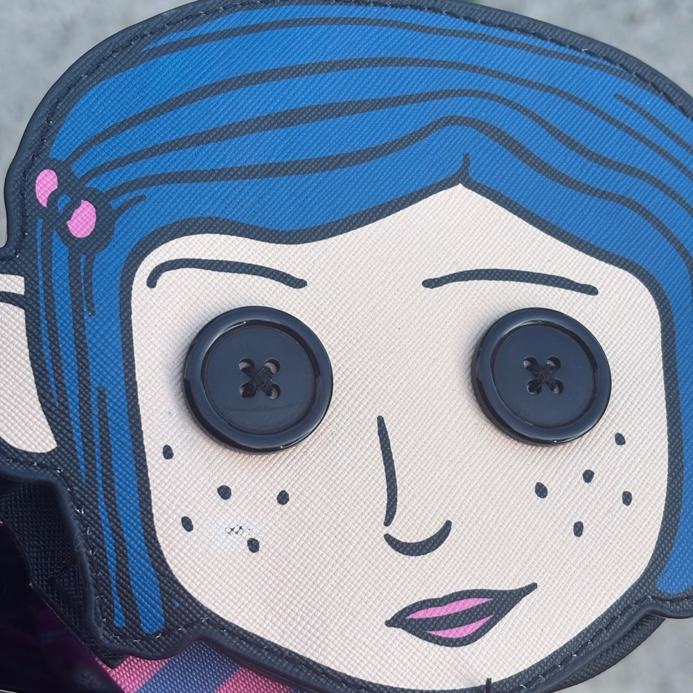 Coraline coin wristlet
